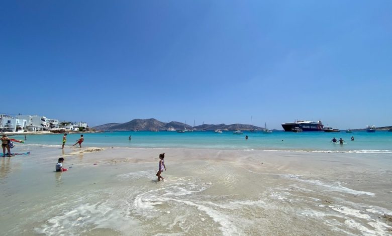 A shallow turquoise beach on Koufonisi in the Cyclades with swimmers